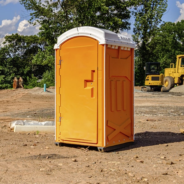 how often are the porta potties cleaned and serviced during a rental period in Baker